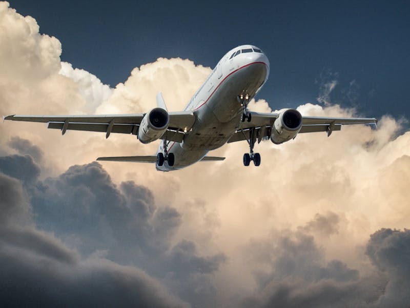 Aircraft landing at airport, symbolizing Bush Intercontinental Airport's role in Ebola screening